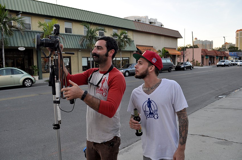 John Lichtenstein and Roger Naughton review photographs.