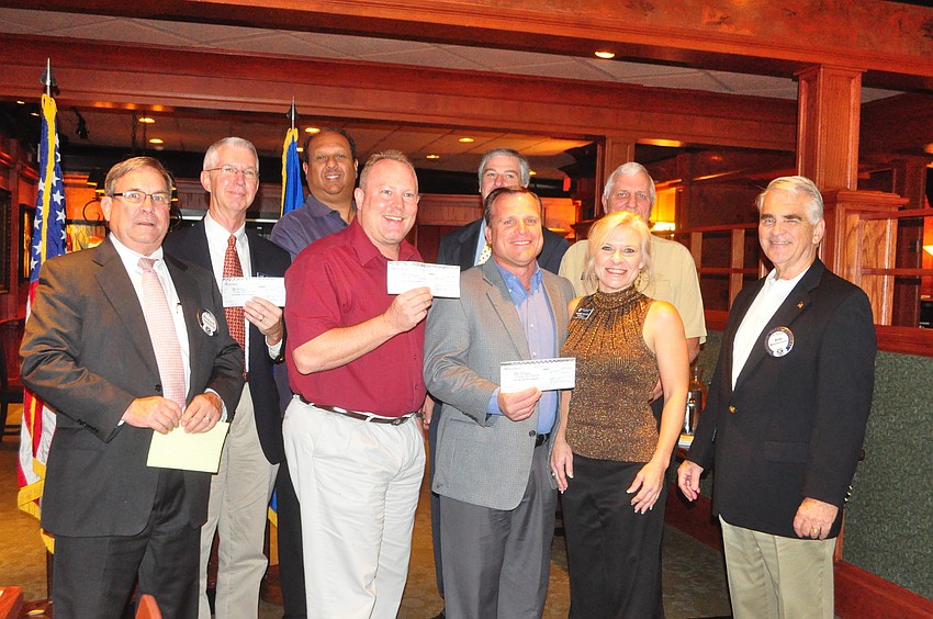 front, Doug Staley, Bill Sadlo, Valerie Nelson; back, Richard Crawford, David Eichlin, Philip Tavill, Mike Phelan, Carl Weeks, Jim Burmeister