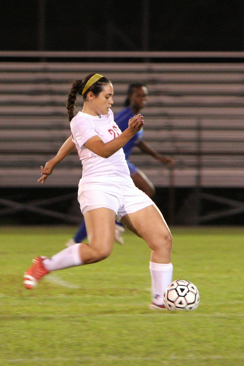 Cardinal Mooneyâ€™s Gabby Ojeda, No. 26, kicks the ball up the field.