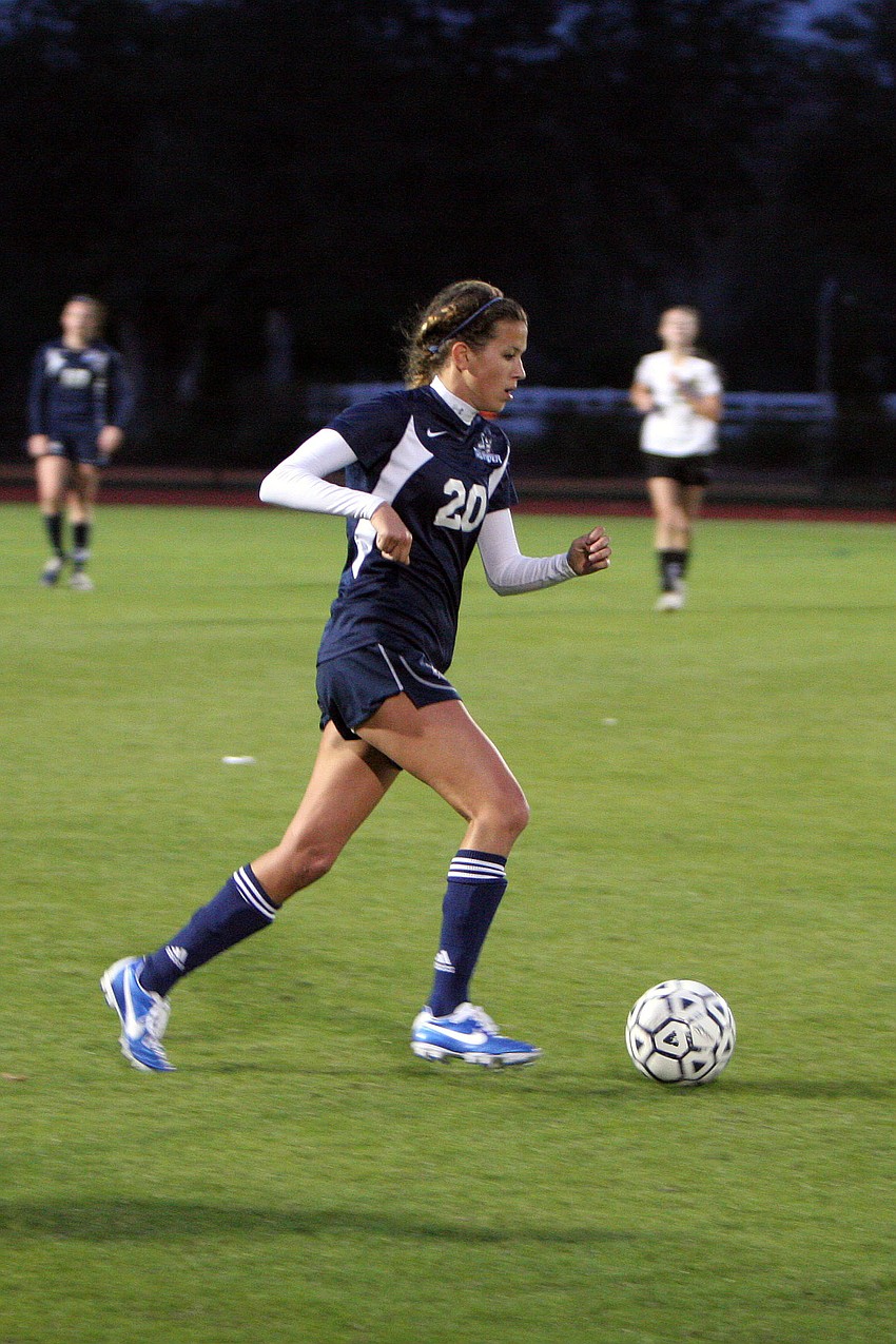 ODAâ€™s Juliet Onufrak, No. 22, kicks the ball up the field.