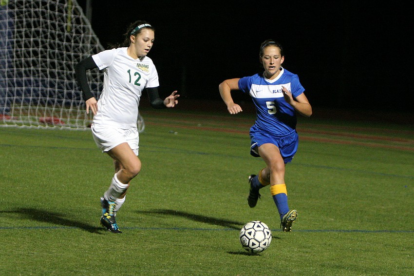 St. Stephenâ€™s Alexis Sedillo, No. 12, and Sarasota Christianâ€™s Brittany Swart, No. 5, go after the ball.