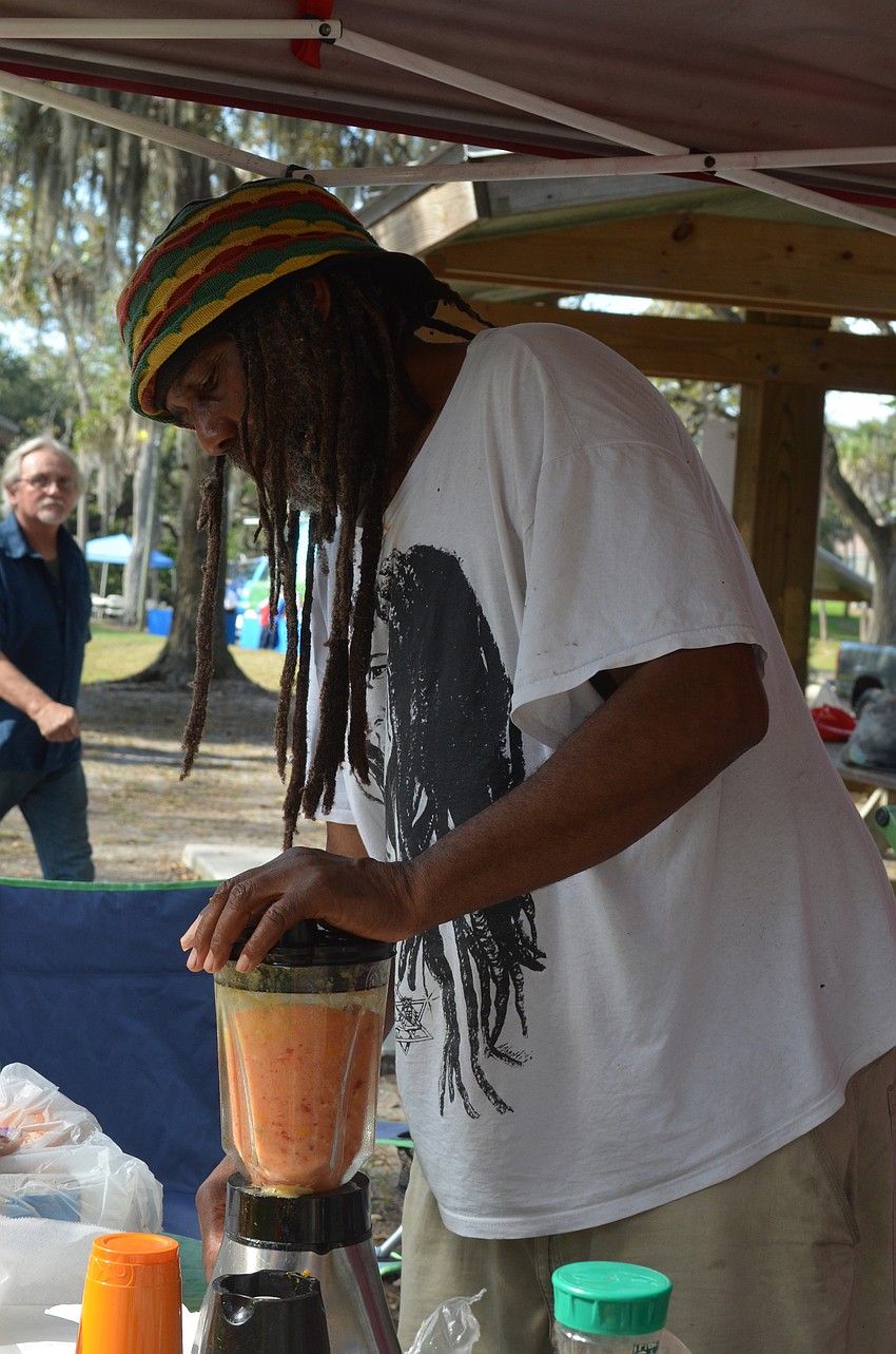 Maceo Elby makes fruit smoothies and sells veggie burgers. His business Asinamalai means nothing to lose in Swahili.