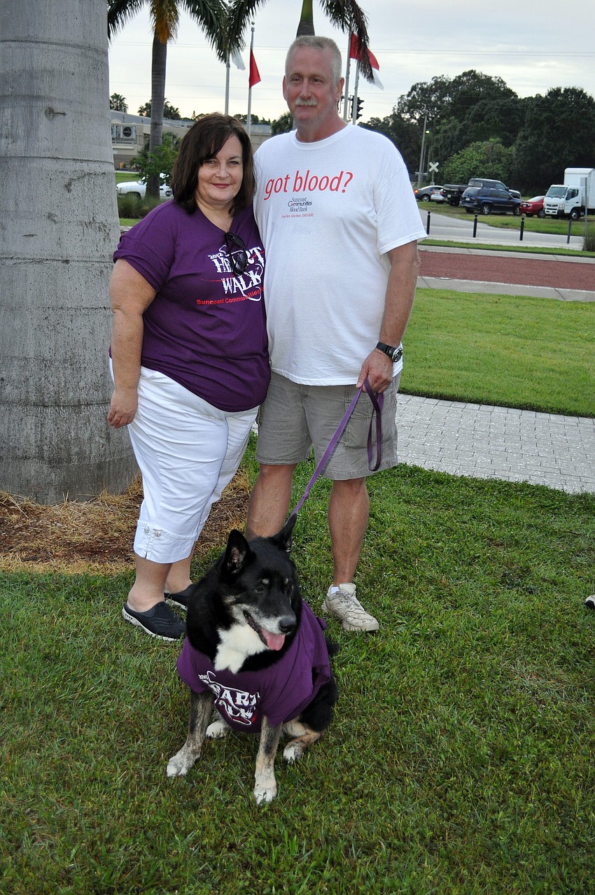 Karen and Chris Hoder with their dog, Josey.