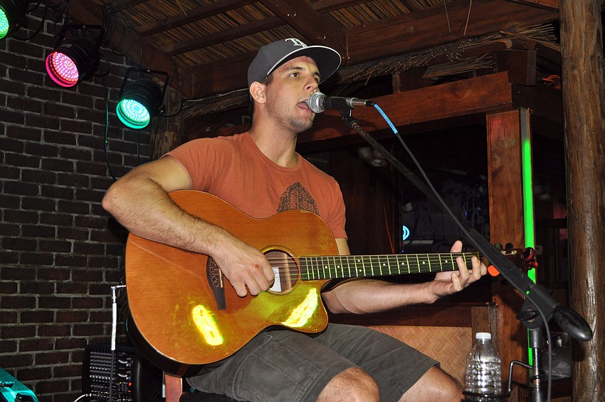 Matt Gherhardt donated his time and talent to the Cure Cara fundraiser Thursday, Oct. 4 at Beach Club.
