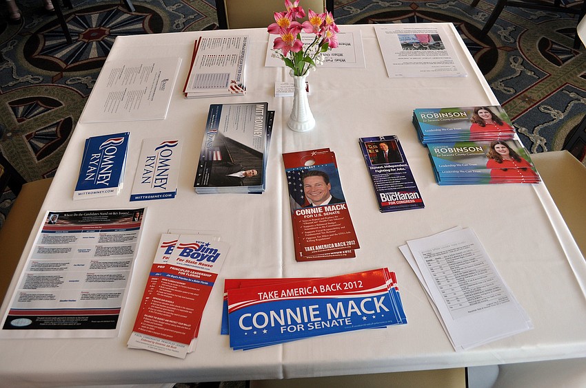 A variety of pamphlets, papers, stickers and signs were available to those who attended the meeting Friday, Oct. 12, at the Sarasota Yacht Club.