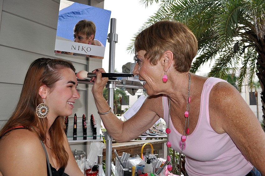 Abby Ruehlmann has her makeup done by Joan Woods of Sassy Hair Salon Sunday, Oct. 14.