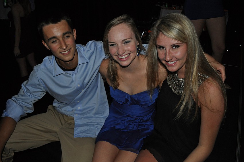 Joseph Plechy, Blaire Cornetet and Lauren DelFabro had fun at the dance Oct. 20.