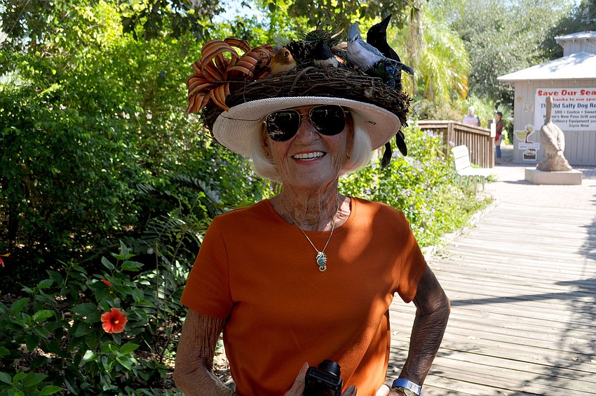 Barbi Nutting shows off her bird hat.