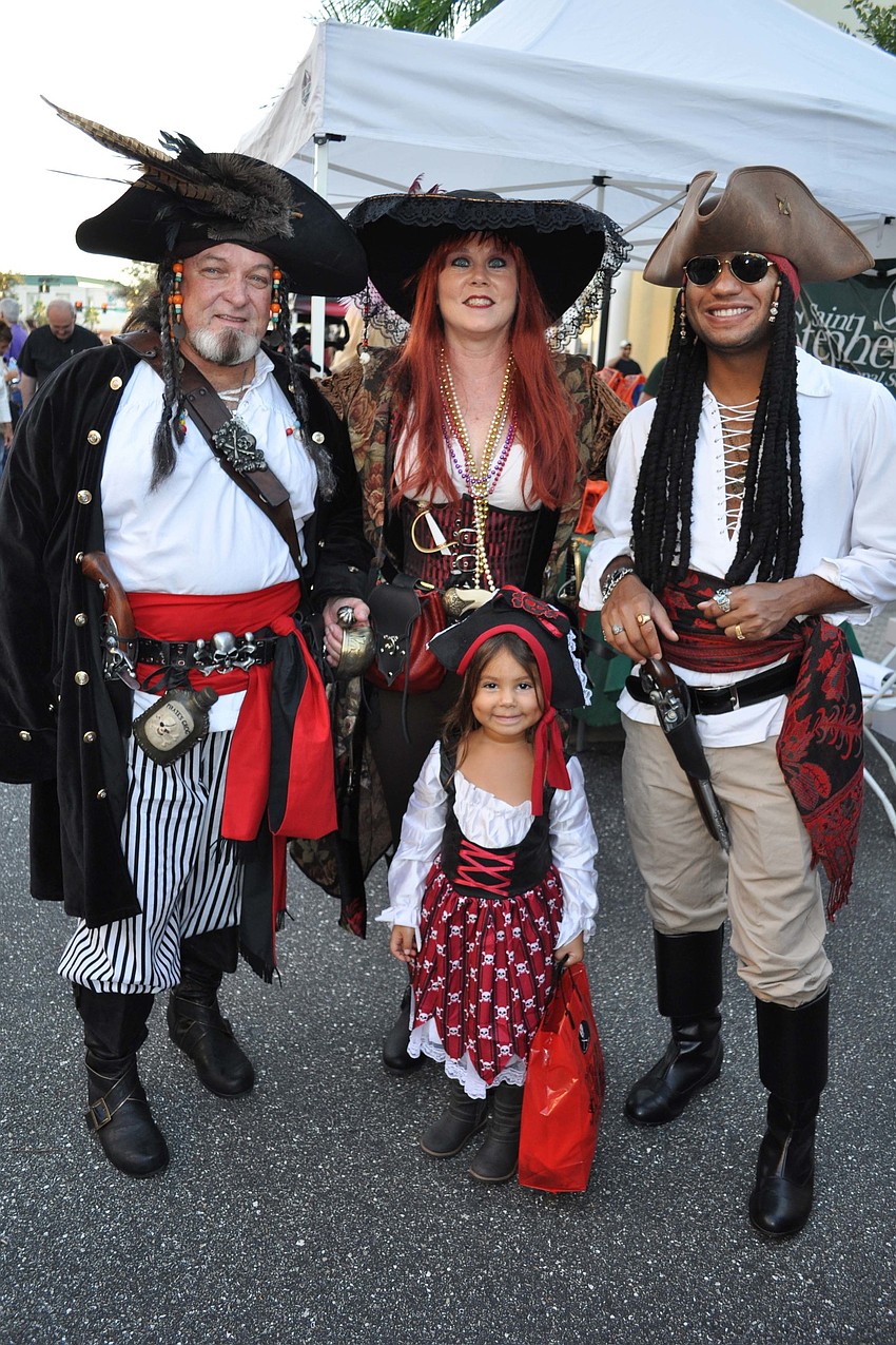 Mike Decker, Deborah Thompson, John Decker and 4-year-old Vecie Powell, front, came out in their pirate attire.