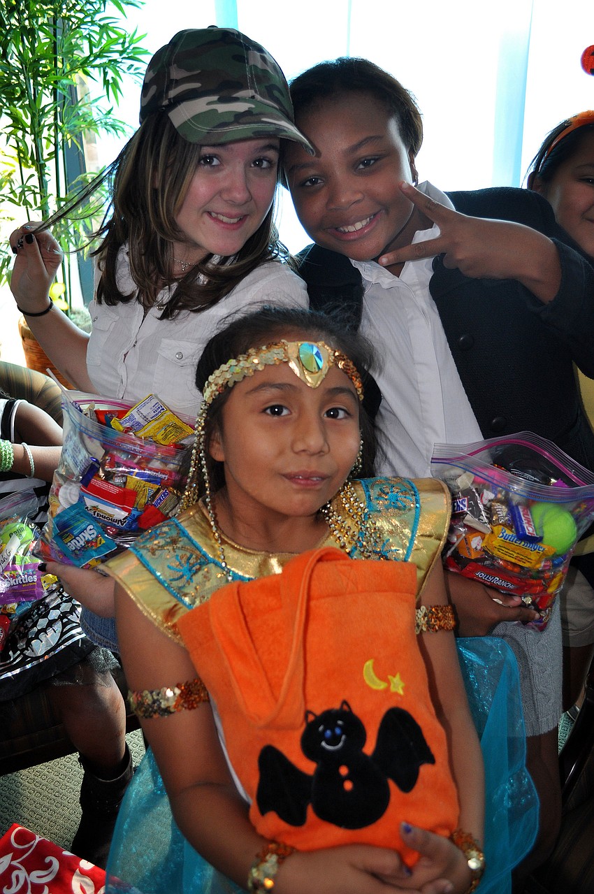 Sarah McIntyre, 11, Cazandra Ramos, 10, and Sheridan Jules, 11