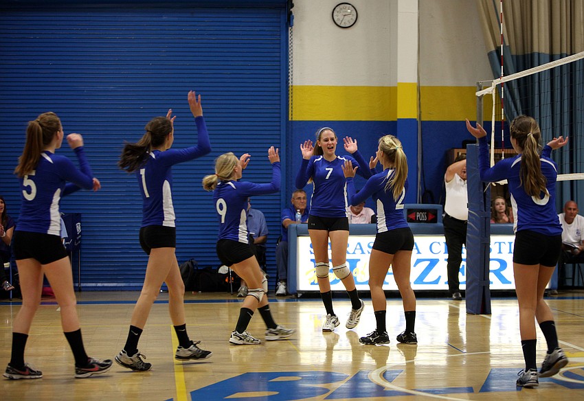 Sarasota Christian celebrates an impressive point Saturday, Nov. 10, during the Class 2A-Region 3 championship between Sarasota Christian and Lake Worth Christian at Sarasota Christianâ€™s Blazer Gym.