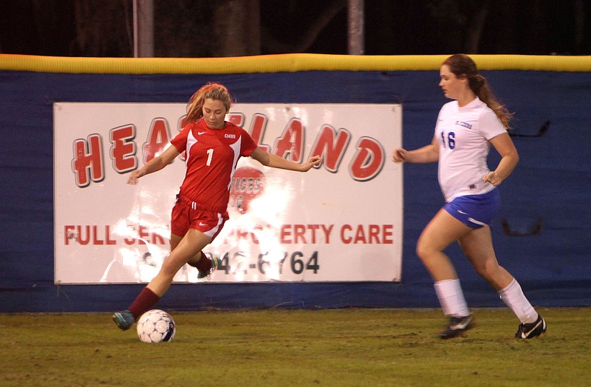 Cardinal Mooneyâ€™s Anna Brusco, No. 1, tries to keep the ball away from Sarasota Christianâ€™s Sydney Kinsch, No. 16.