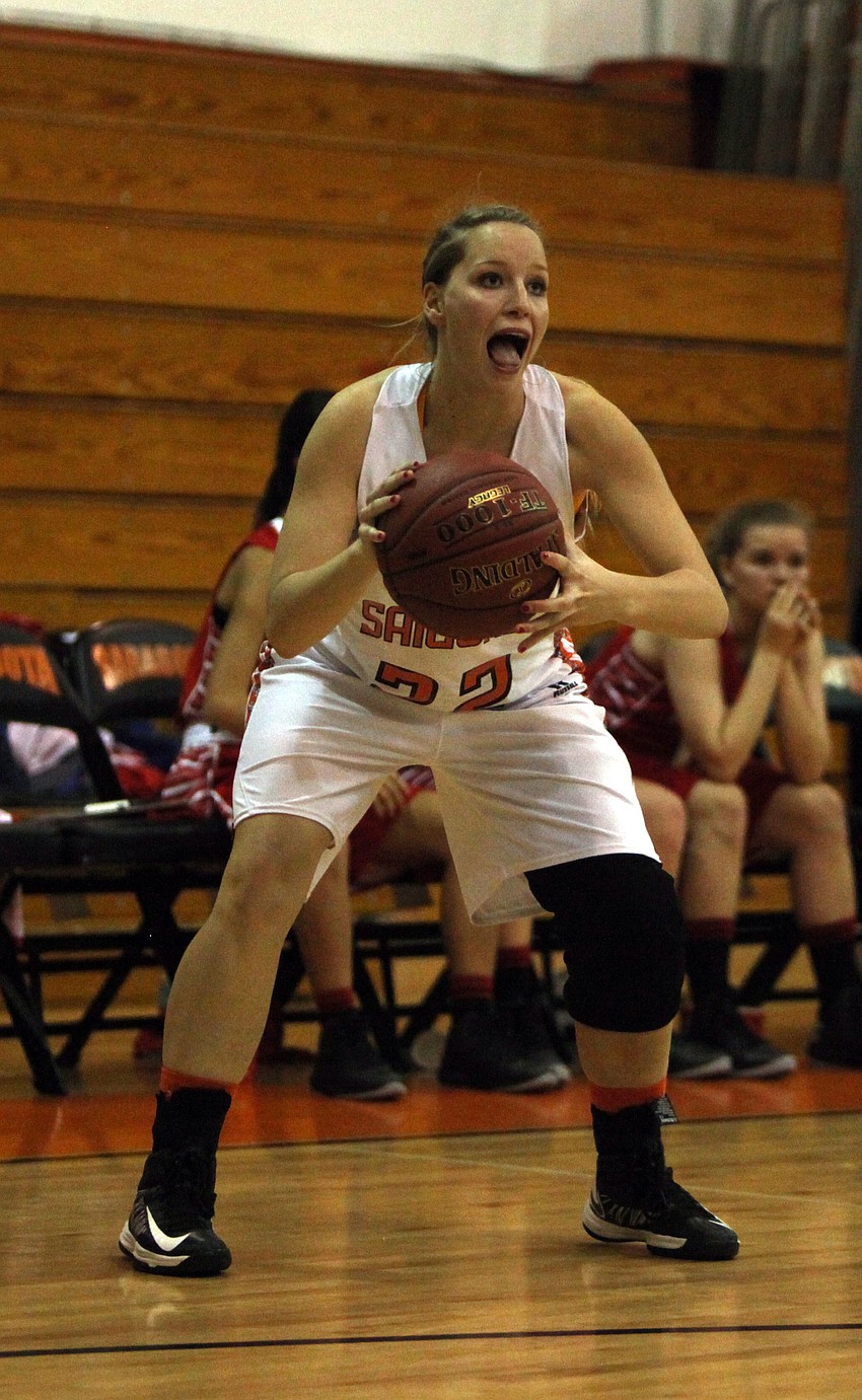 Sarasotaâ€™s Caylee Wallace, No. 22, yells out to her teammates.