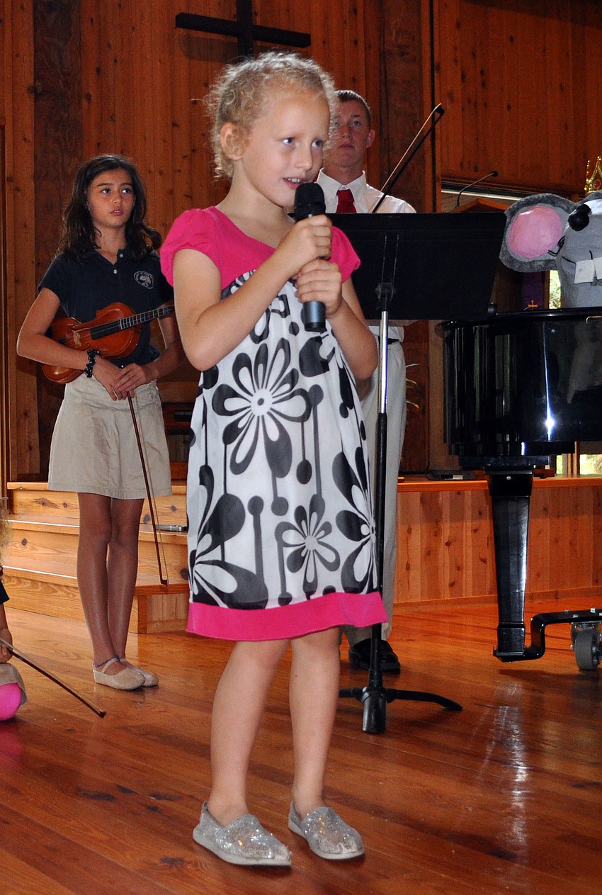 Claire Giraud sings â€œO Come Little Childrenâ€ Tuesday, Dec. 11, during the Christmas and Holiday Music Fest at Siesta Key Chapel.