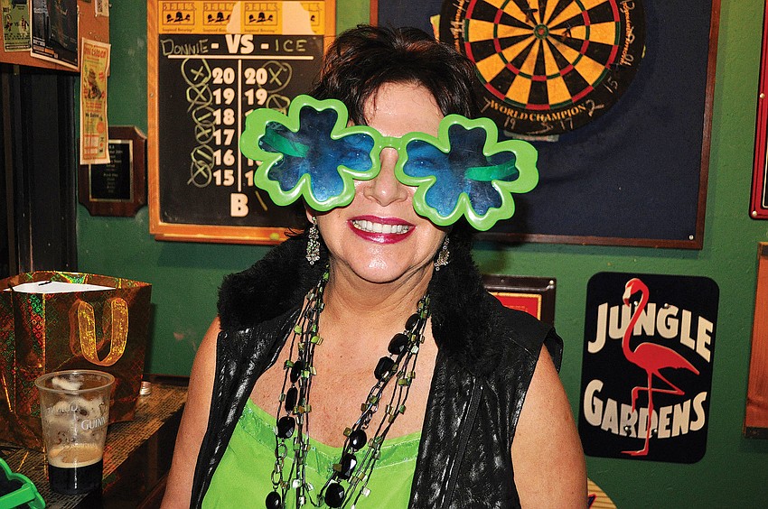 Tricia Foster wore some fun shamrock glasses at Shamrockâ€™s fourth annual St. Patrickâ€™s Day Block Party.