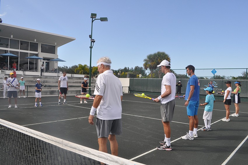 To warm up and get to know each other, players broke into pairs and passed a ball back and forth from incrementally increasing distances.