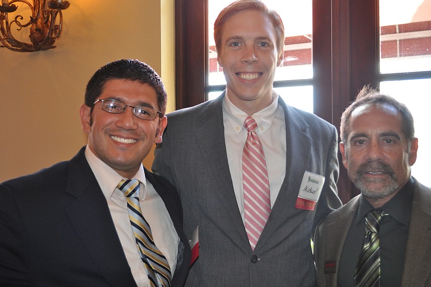 Cesar Gomez, a attorney, with Michael Marquet, a new Lakewood Ranch Business Alliance member, and Barry Rothstein of the Tampa Bay Business Journal