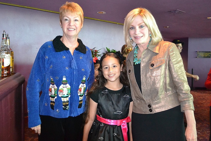 Managing Director Mary Ann Servian, Dance Next Generation student Melanie Gonzalez and board chair Hillary Steele
