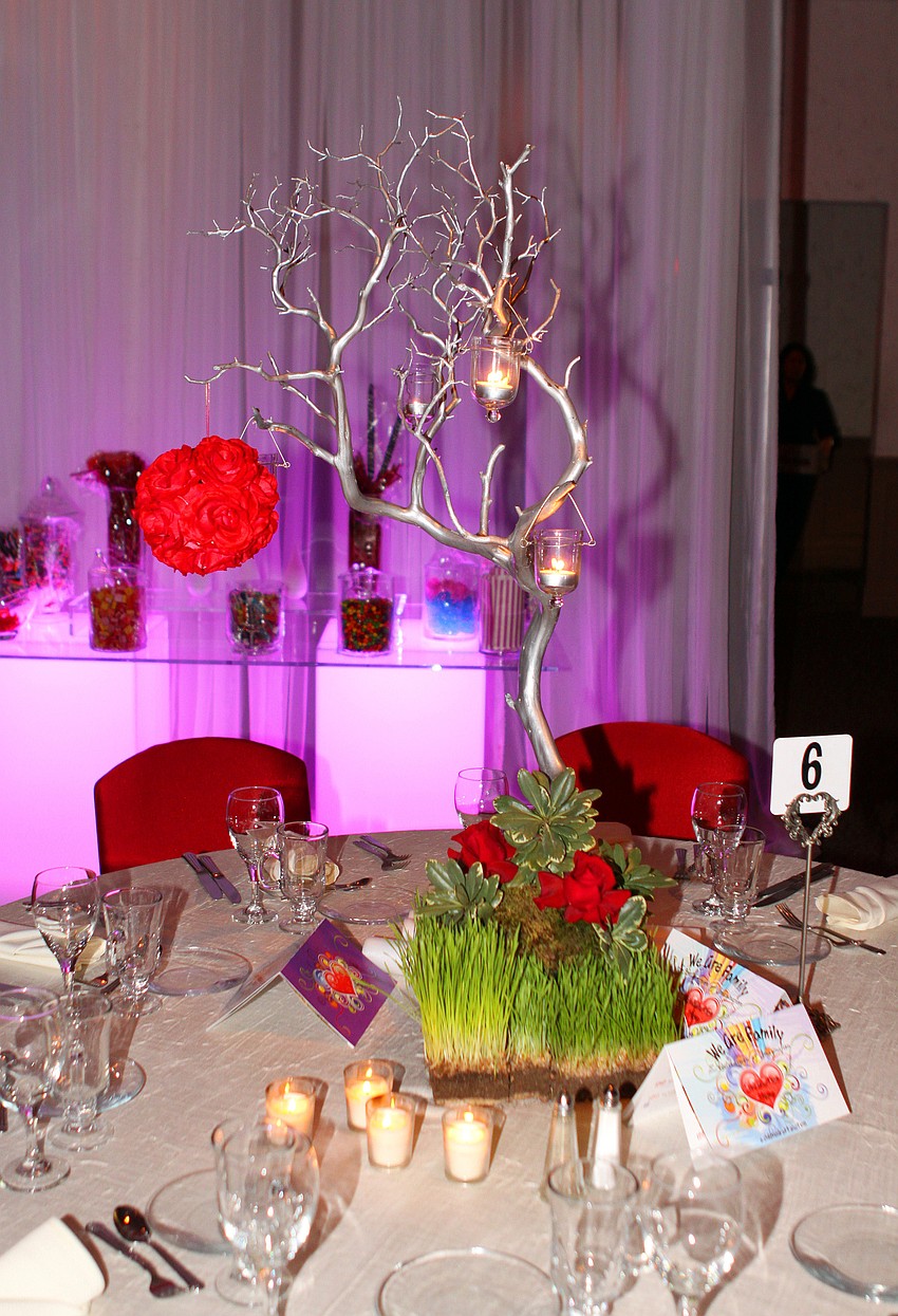 Table centerpieces had a heart-shaped, pre-Valentine's Day theme.