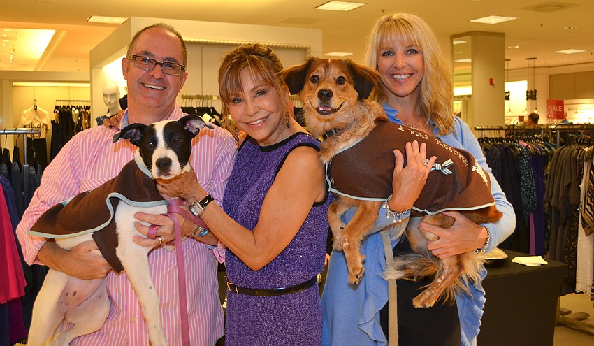 Kirk and Chris Voelker with Lucy and Kristi Dorman with Bailey