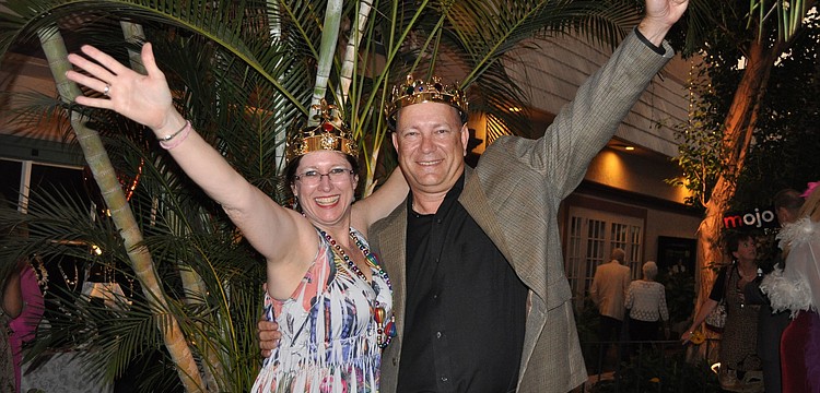 Charimen Grace Carlson and Steve Altier were Queen and King of the Mardi Gras themed gala.