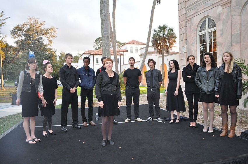 Acapellago sing in front of College Hall.