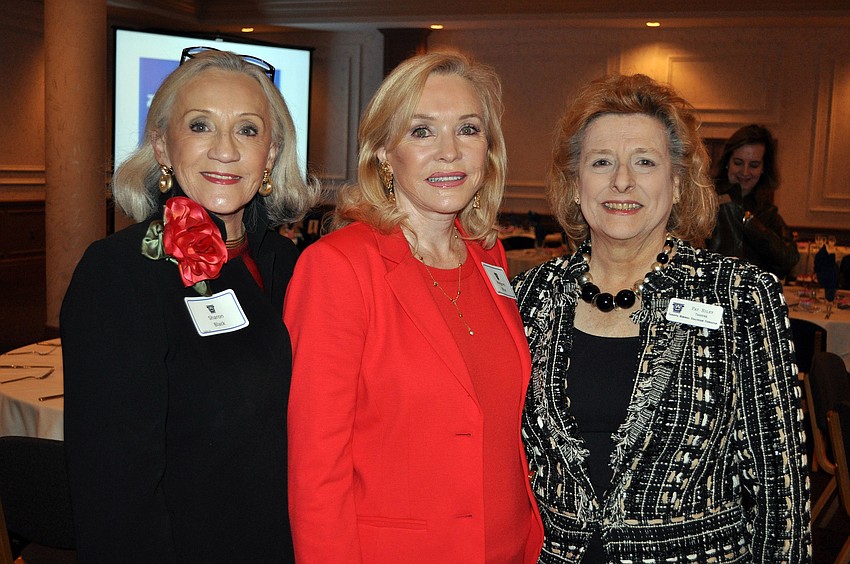 Sharon Black, board president Margaret Wise and Pat Riley