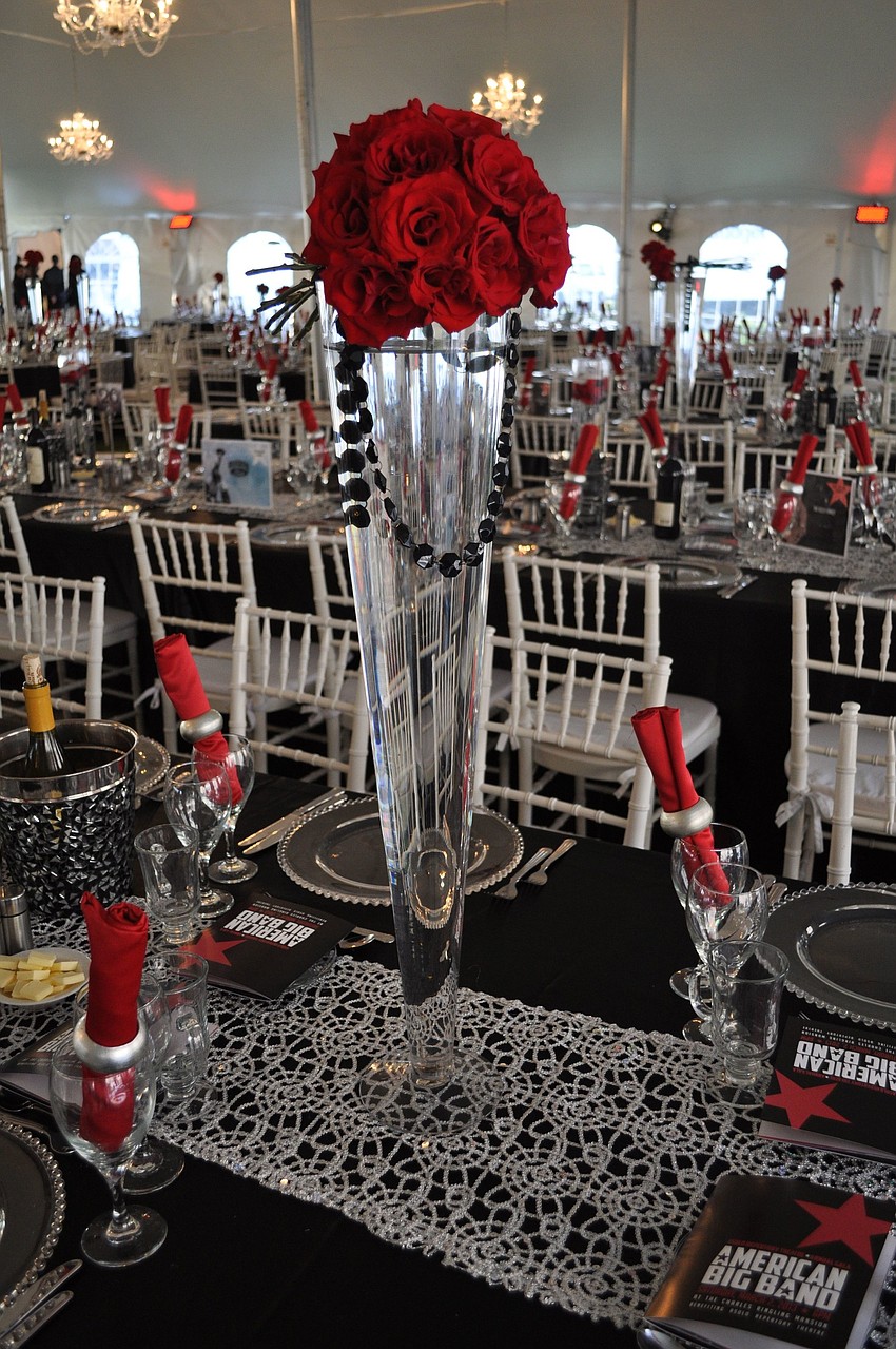 The decor was red, white and black with beautiful rose bouquets in glass vases.