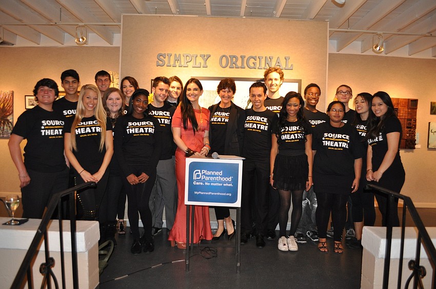 Zara Barrie and KT Curran with members of Source Theatre