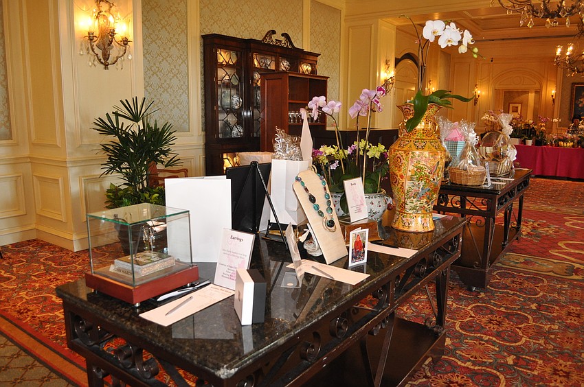 Silent auction items included tickets to New York Fashion Week, a $200 Columbia Restaurant gift certificate, a Kodak waterproof video camera and a variety of sports packages.