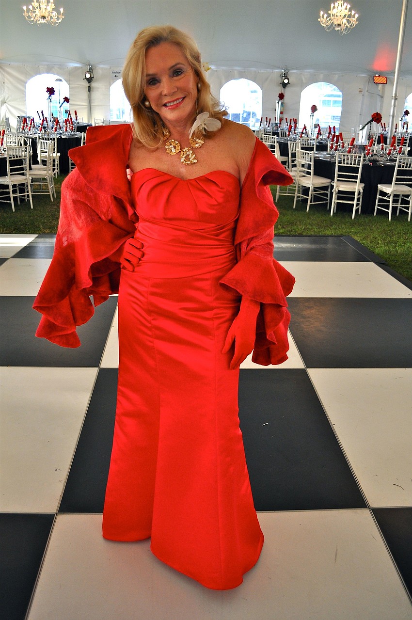 Margaret Wise in her red Dior dress.