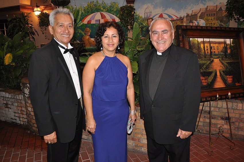 Deacon Humberto and Pia Alvia with Rev. Celestino Gutierrez