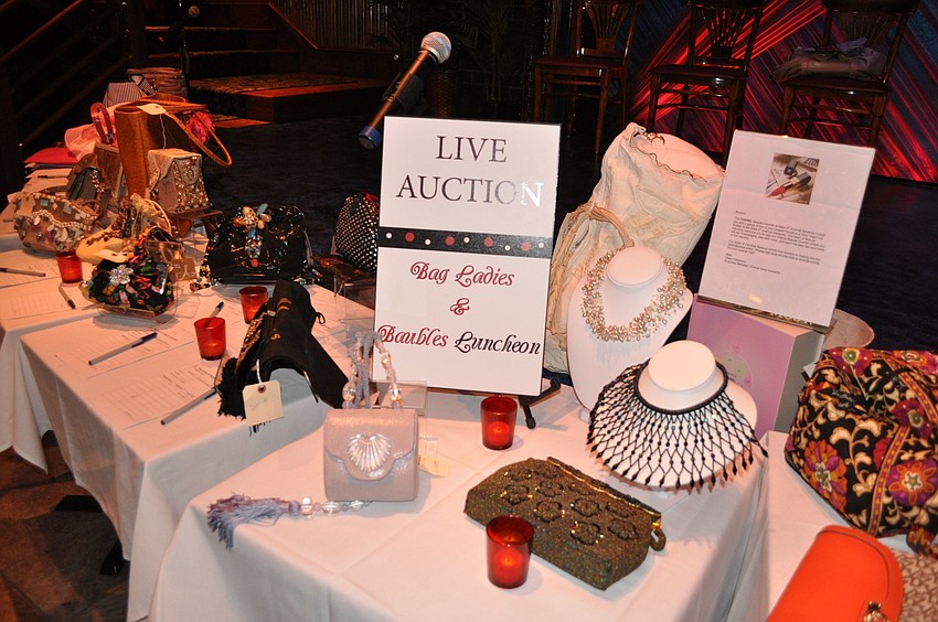 There was a live auction full of bags and baubles.