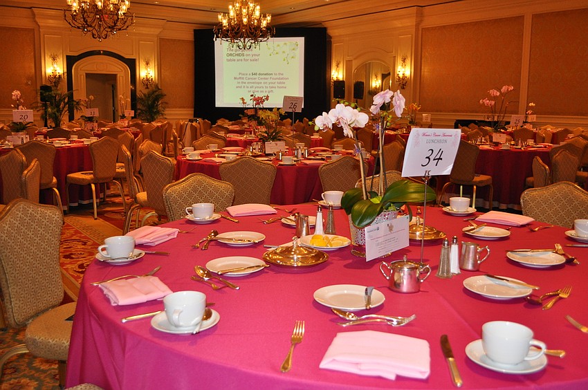 The ballroom was decorated with lots of pink from the orchids to the tablecloths.