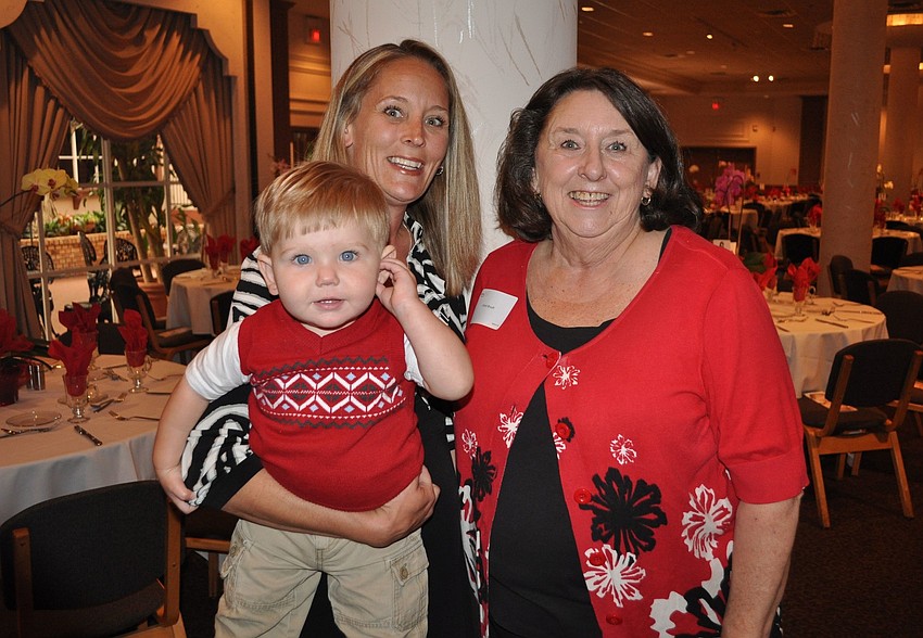 Amy Brush holds her son, Jace, 11 mos., while spending time with her mom, Carol Brush.