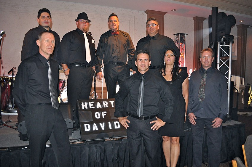 Heart of David poses together before performing at the benefit.