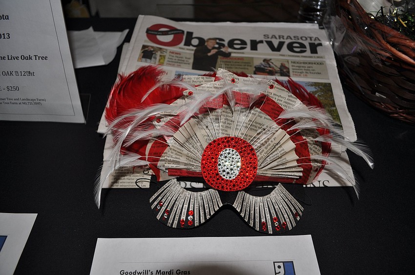 The Observer Media Groupâ€™s Mardi Gras mask was up for auction.