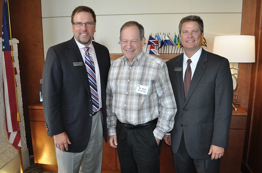 Scott Atkins, Dr. Ken Newmark and Paul G. Hudson