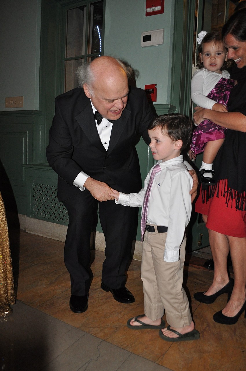 President Dr. Donal Oâ€™Shea greets his grandson, Ainsley Oâ€™Shea, 4 Â½.