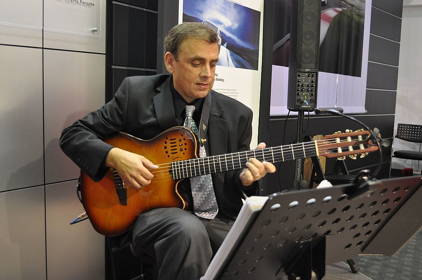 Pete Simms played the guitar throughout the cocktail hour.