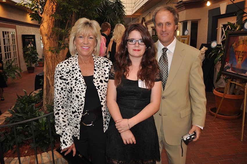 Courtney Thomassen with her parents Kate and Chris Thomassen
