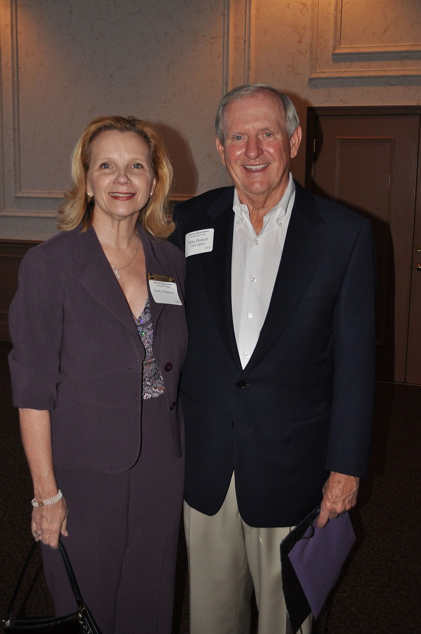 Kathy Mathews and guest speaker Mike Plunkett