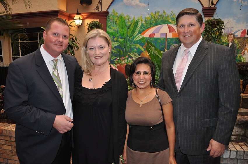 Michael and Sonia Gibson with Angelica and Dale Wolf