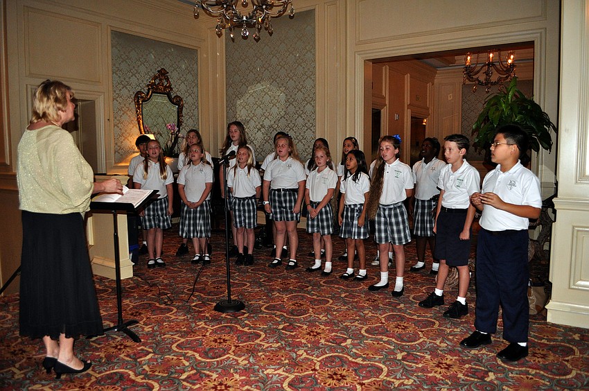 Students from Incarnation Catholic School sang songs in the lobby of the Ritz-Carlton Sarasota.