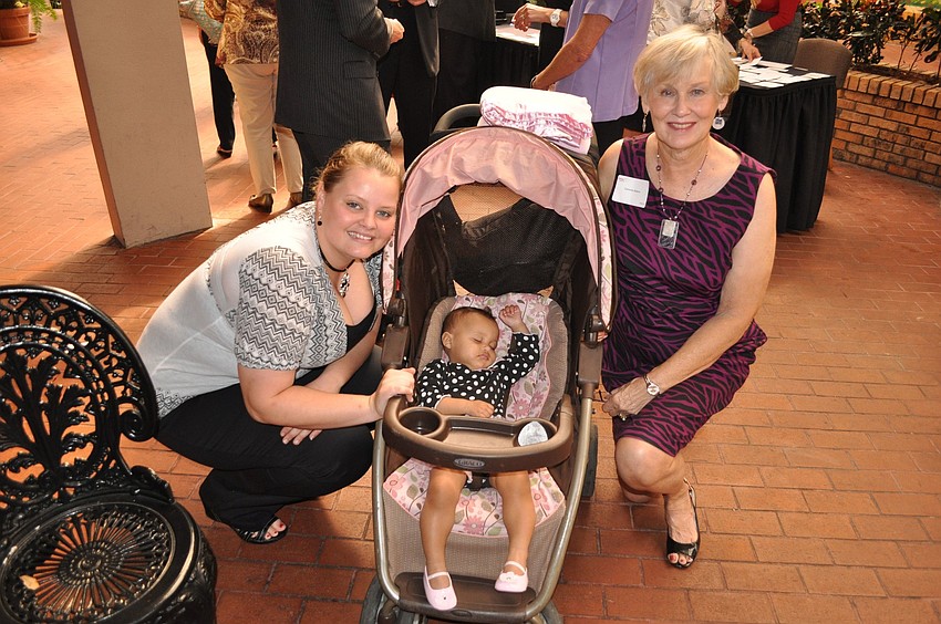 Jessica Moon with her daughter, Jazlyn, 1, and Cammie Adams