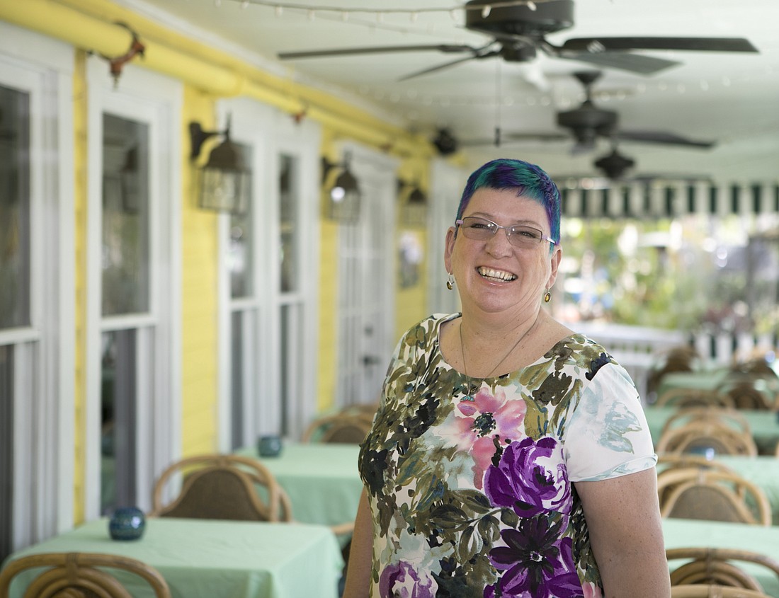 Veronica Champion has made $230,000 worth of environmentally friendly upgrades to the historic Peninsula Inn in Gulfport thanks to innovative use of a federal clean energy program. Photo by Mark Wemple.
