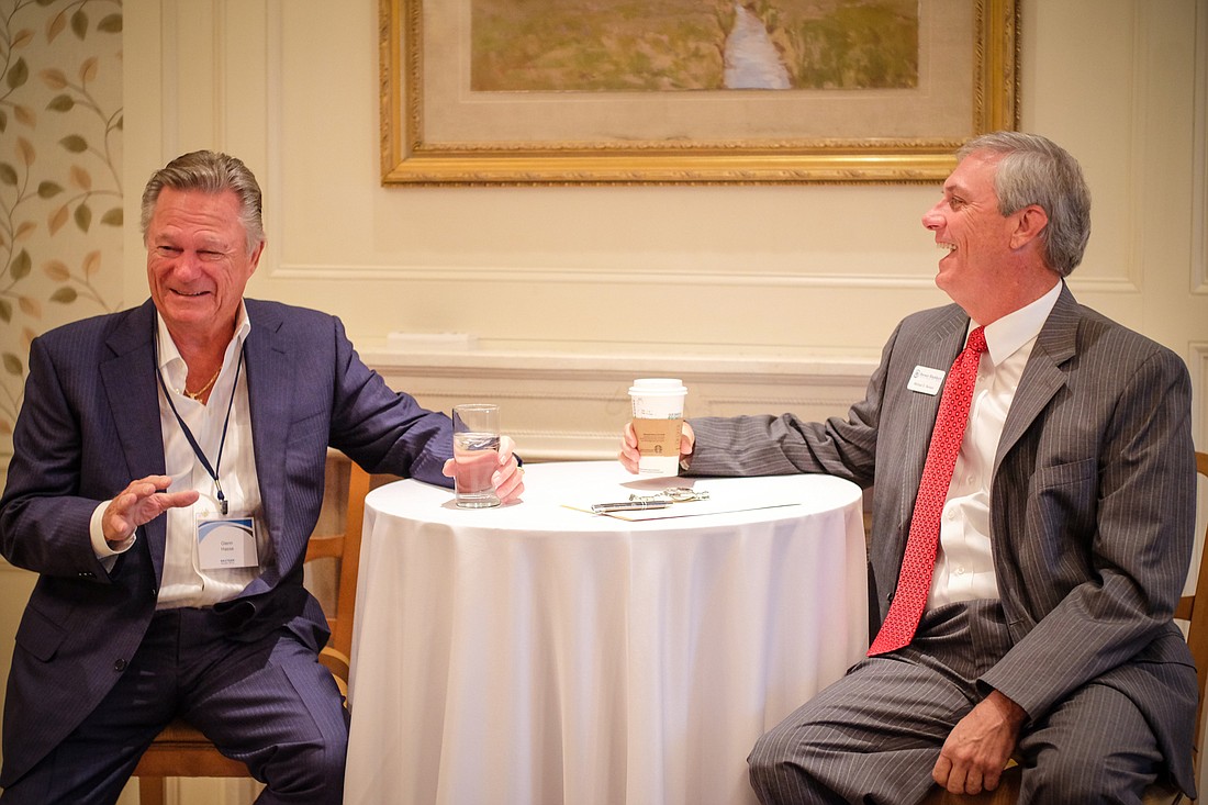 Glenn Hasse, left, former president of Ryt-way Industries, recently spoke at an event in Naples organized by wealth consulting firm Benson Blackburn. Michael Benson, right, is the chairman and CEO of Benson Blackburn.