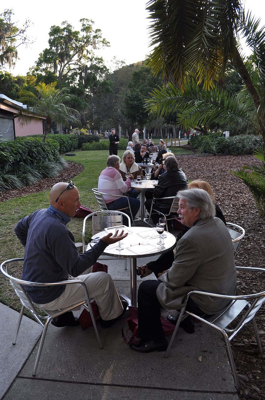 People sit, sip and eat while in the Argentina region.