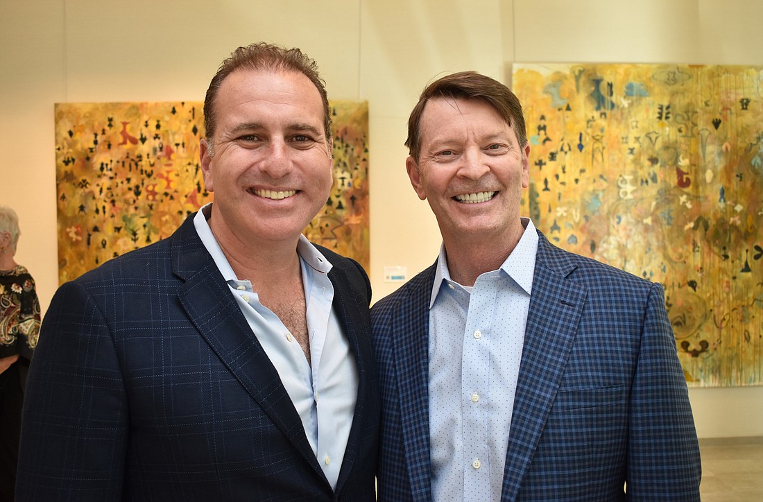 Niki Kottmann. Larry Abbo, CEO of Prime Group, with Angus Rogers, president and CEO of Floridays Development Co. at the recent Art Ovation Hotel opening in Sarasota.