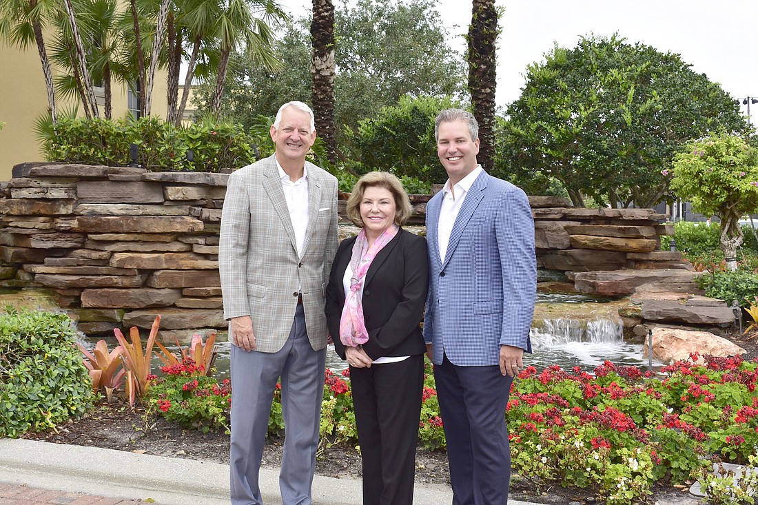 From left, Budge Huskey, president, Premier Sothebyâ€™s International Realty; Judy Green, CEO, Premier Sothebyâ€™s International Realty; and Brian Stock, Stock Realty.